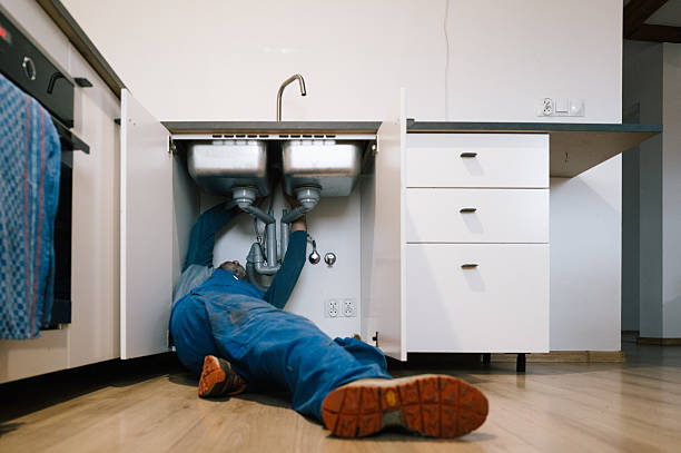 Professional Emergency Plumber technician working in Clinton, CT